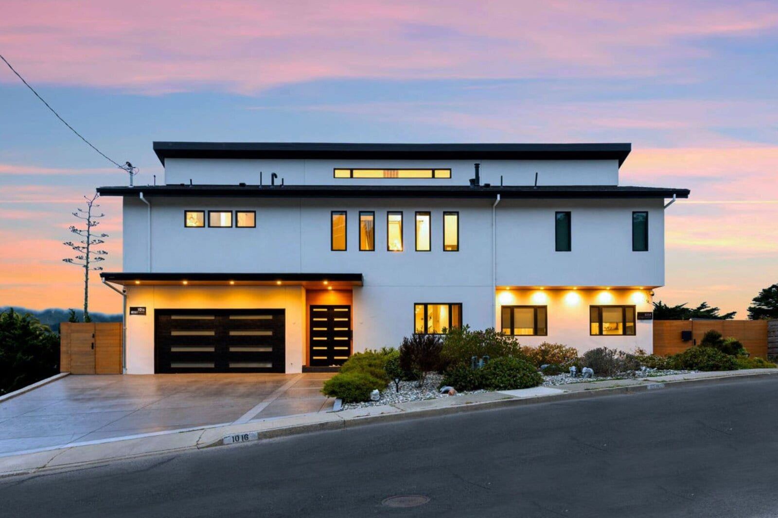 Modern multi level home exterior at sunset pacifica