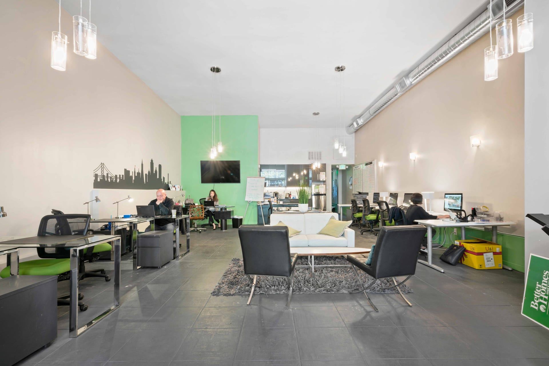 Industrial open office with collaborative lounge area