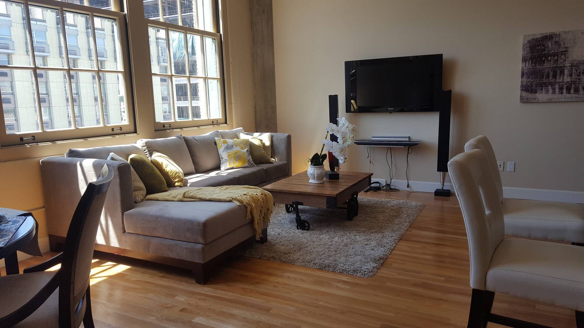 Urban loft living room with oversized windows