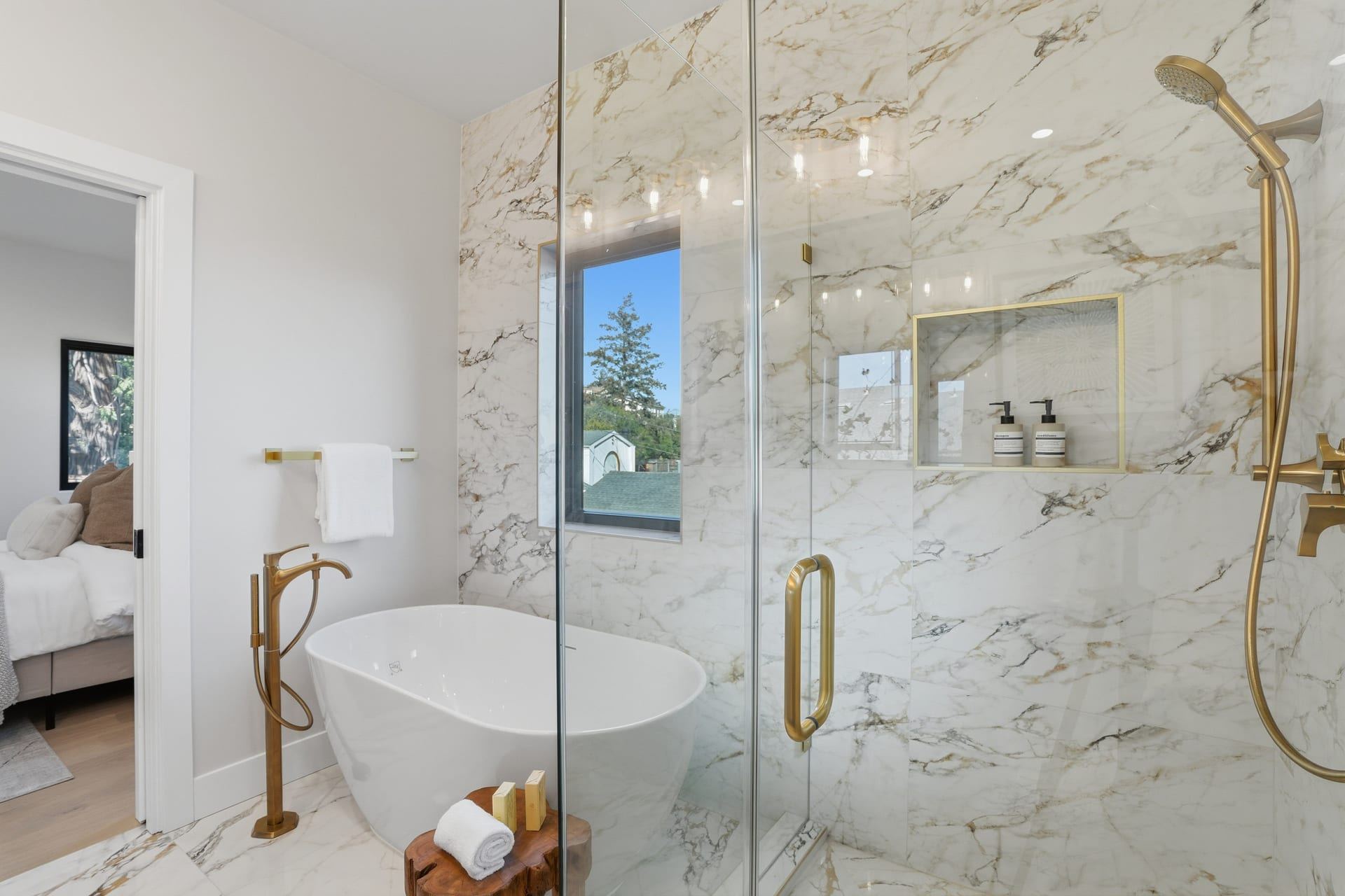 Luxury bathroom with freestanding tub and glass walk in shower
