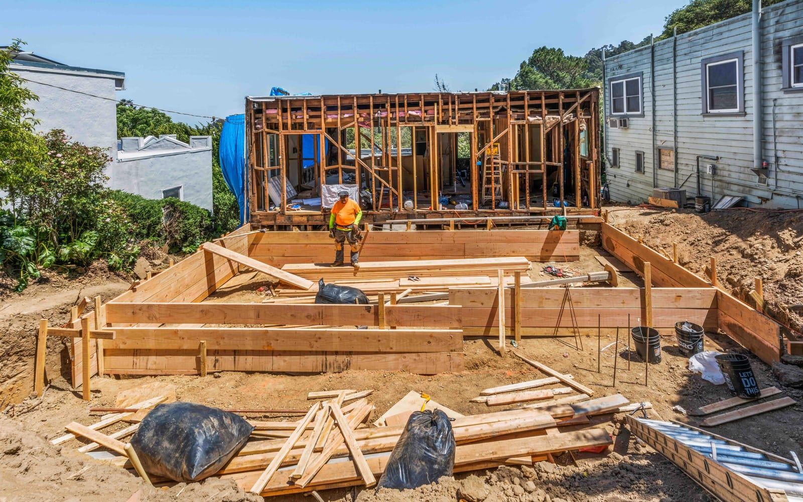 Foundation and framing work on a rear home addition