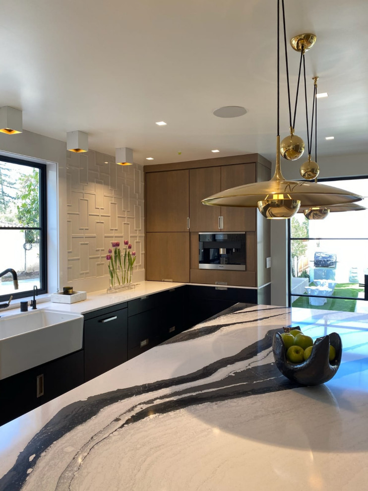 Modern Black and Wood Kitchen with Dramatic Waterfall Island